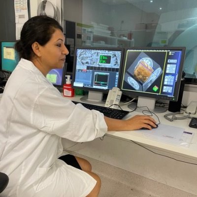 Dr Fatima Nasrallah looking at images of the brain